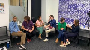 Portrait of mixed race business team having a discussion in office.