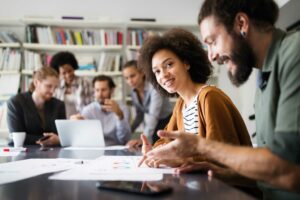 Portrait of mixed race business team working together